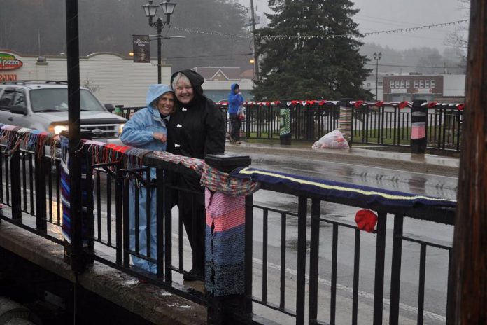 Volunteers installed the poppies on a cold and rainy November day, reminding them of the terrible conditions endured by Canadian soldiers in the trenches during World War I. (Photo: Hospice North Hastings / Facebook)