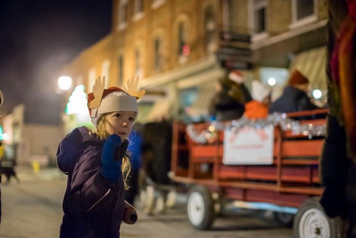 There are lots of activities for the entire family during Christmas in the Village, including horse-drawn wagon rides, a gingerbread house display, a juggler, crafts, and games. (Photo: Marjorie McDonald)