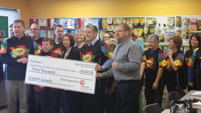 Crayola Canada general manager Paul Murphy (left) presents a cheque for $40,000 in proceeds from the annual Crayola sale to United Way for the City of Kawartha Lakes.  (Photo: United Way of City of Kawartha Lakes)