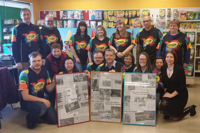 The United Way of City of Kawartha Lakes presented the Crayola Canada team with framed newspaper clippings representing the history of the Crayola sale.  (Photo: United Way of City of Kawartha Lakes)