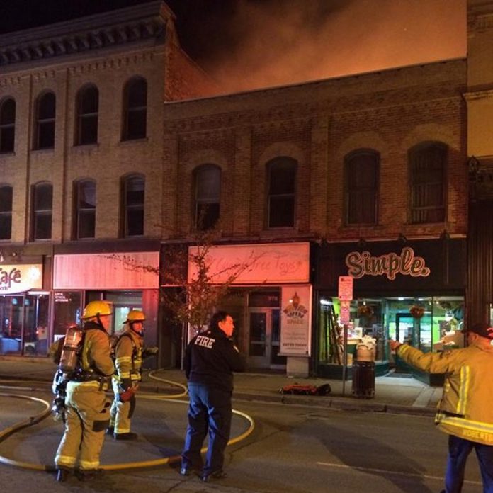 Firefighters arrive at the scene of the burning building in downtown Peterborough. (Photo: Don McBride)