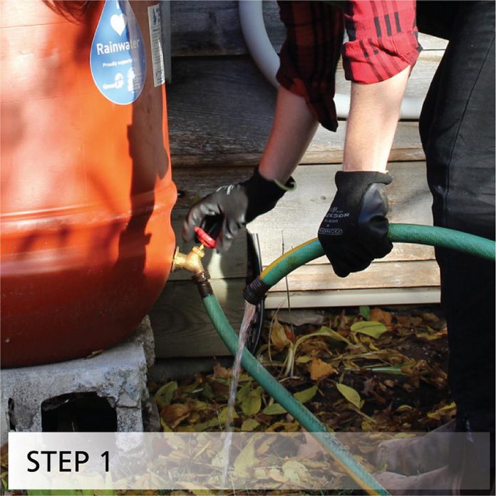 Drain all of the water out of the rain barrel and leave the spigot open