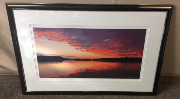 'Stony Lake Daybreak', a framed photograph by Peter Lamont, is one of the new items up for bid.