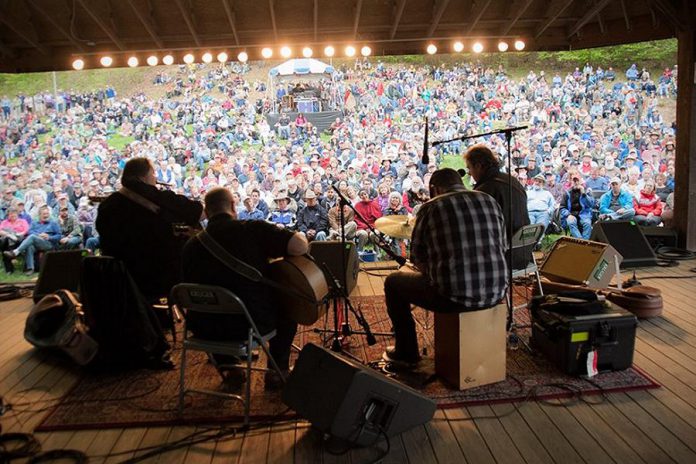 The Kruger Brothers performing at MerleFest 2013 in their hometown of Wilkesboro, North Carolina.