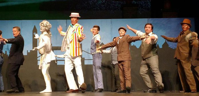 Warren Sweeting and Ben Jackson with the male chorus for 'Jolly Holiday'. (Photo: Sam Tweedle / kawarthaNOW.com)