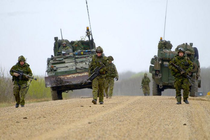 Members of the Canadian Forces during the 2015 "Maple Resolve" military training exercise in Alberta. You may spot military vehicles and soldiers wearing camouflage in the Kawarthas from November 24 to 26 for the "Worthy Charge" training exercise. (Photo: Sgt Dan Shouinard, Maple Resolve 15, LF2015-0025-033)