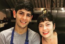 17-year-old Omar Hattab, a new Canadian from Syria, with Sue Houde, who owns and operates Two Dishes restaurant in downtown Peterborough along with her sister Paula. Omar is now working at Two Dishes doing what he loves, baking, thanks to Sue and Paula with support from the New Canadians Centre. (Photo courtesy of New Canadians Centre)