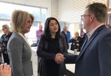 Jeff Day (right) is resigning as executive director of Community Futures Peterborough, effective January 12, 2018. At a December 8th Eastern Ontario Development Program announcement, Day shakes hands with Peterborough-Kawartha MP Maryam Monsef as Wendy Curtis, Executive Director of Northumberland Community Futures Development Corporation, looks on. (Photo: Office of Maryam Monsef)