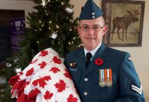 Corporal Roy receiving his soldier blanket in November 2017 from Cuddles for Cancer, which is hosting a "True Meaning of Christmas" event on Saturday, December 9th at the Cuddles Drop In location at 15 Queen Street in Lakefield. The day will begin with packing 17 boxes for Canadian soldiers who are serving overseas in Iraq, Romania, Kuwait, Ukraine, and Latvia. (Photo: Cuddles for Cancer)