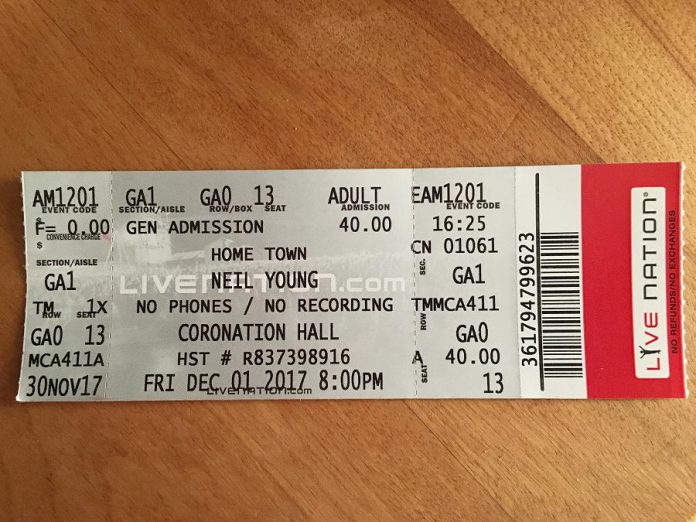 Tickets for the Omemee Neil Young concert weren't on sale to the general public, but people who were on on the guest list for the concert received a printed ticket as a keepsake.  Émilie Quesnel's father, along with other teachers at Scott Young Public School (named for Neil's father), were given the opportunity to donate $40 to attend the concert. (Photo: Émilie Quesnel)