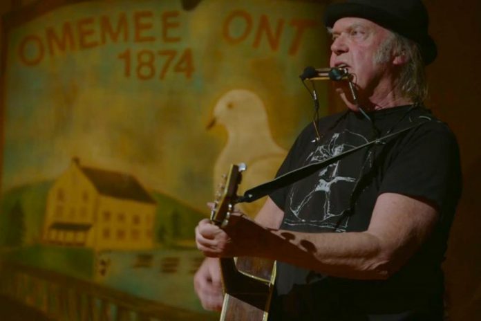 Neil Young performing at Coronation Hall in Omemee, Ontario, on December 1, 2017 as part of his "Home Town" concert that was live-streamed in Canada and around the world.