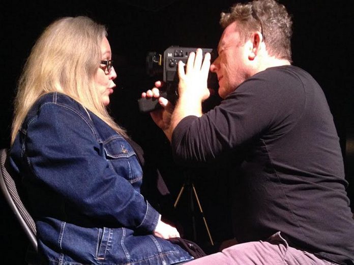 Wayne Eardley shoots Super 8 film of actor Dianne Latchford. (Photo Lester Alfonso)