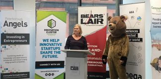 2018 Bears' Lair Chair Diane Richard of Diatom Consulting with the entrepreneurial competition's mascot at VentureNorth in downtown Peterborough on January 12th, where the opening of the annual competition was announced. An orientation session for interested entrepreneurs takes place on Tuesday, January 16 at the Peterborough Chamber of Commerce. (Photo: Bears' Lair)