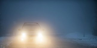 Car headlights in fog