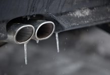 Car tailpipe in winter