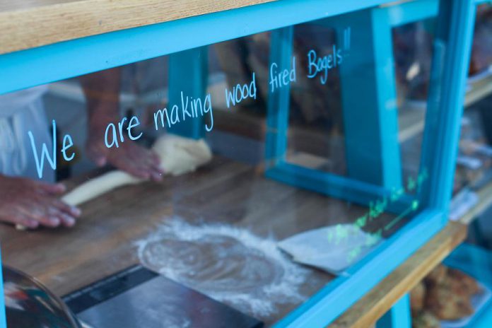 When Hard Winter Bread Company owners Graham Thoem and Jessica Arsenault discovered Montreal-style bagels when they living in the Montreal. Unlike New York-style bagels, Montreal-style bagels are smaller, thinner, sweeter and denser, with a larger hole, and are always baked in a wood-fired oven. (Photo courtesy Hard Winter Bread Company)