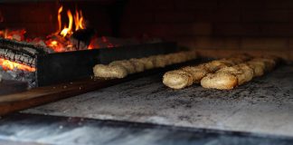 Hard Winter Bread Company, a wood-fired sourdough bakery in Lakefield owned by Jessica Arsenault and Graham Thoem, found demand for their handmade baked goods, including their popular Montreal-style bagels, grew quickly beyond their expectations. They applied for and received matching funding through the Community Futures Eastern Ontario Development Program (EODP) to help them hire additional staff and build a new wood-fired oven. (Photo courtesy Hard Winter Bread Company)