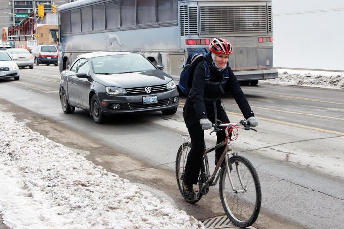 GreenUP's Jenn McCallum cycling to work in the winter. Winter weather can be chilly and windy, but why not try ditching the car and choosing a more healthy and active way to get to work? You can also save a lot of money by choosing active transportation instead of driving. (Photo: GreenUP)