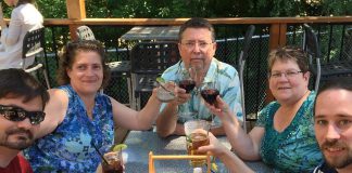 Emmatt Digital Solutions is celebrating its 20th anniversary in 2018. Pictured are owners Chris Calbury (middle) and Kim Appleton (second from right) with some of their staff. (Photo: Emmatt Digital Solutions / Facebook)