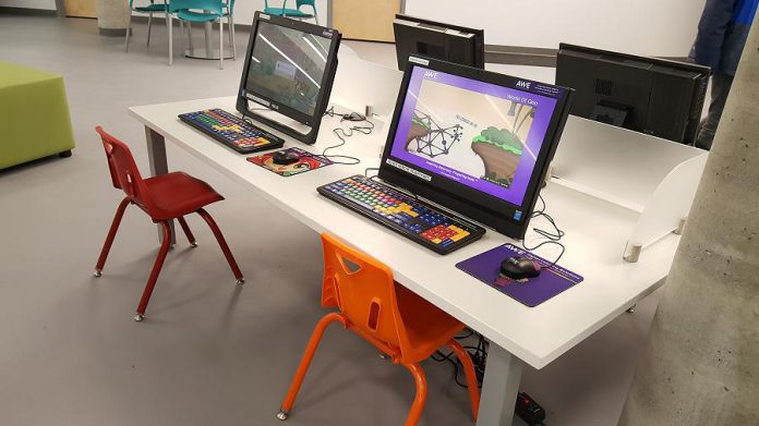 The new library isn't just about books, as these colourful desktop computers in the children's area demonstrate. (Photo: Jeannine Taylor / kawarthaNOW.com)