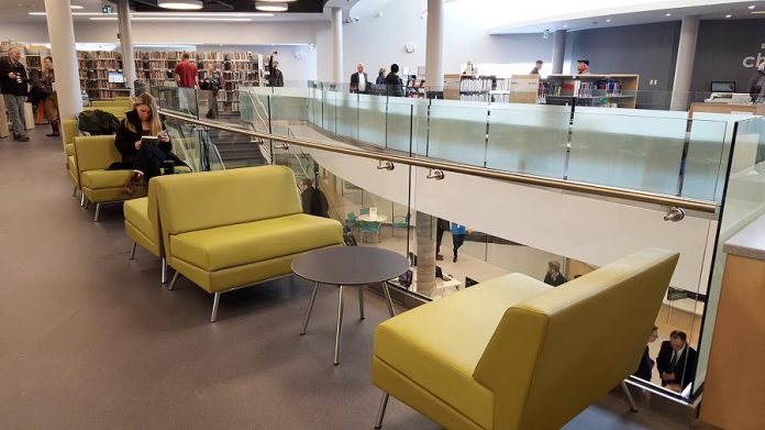 There are plenty of places to sit down and read at the new library. (Photo: Jeannine Taylor / kawarthaNOW.com)