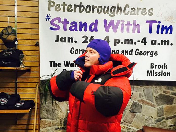 Deputy Police Chief Tim Farquharson trying on some winter weather gear at Wild Rock in downtown Peterborough. Farquharson will be spending a night outside on January 26, 2018 to raise awareness of the plight of the homeless, as well as raise money for YES Shelter for Youth and Families, Brock Mission, and The Warming Room. (Photo courtesy of Peterborough Cares)