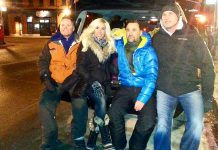 Deputy Police Chief Tim Farquharson (left) with Lindsay Mitchell, Camille Parent, and Tim Burke of Peterborough Cares at the corner of King and George streets in downtown Peterborough during the night of January 26th. The "Stand With Tim" fundraiser raised more than $10,000 for three Peterborough homeless shelters. (Photo: Matthew Stewart / Instagram)