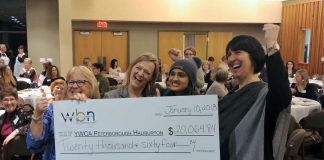 Anne Arnold and Corinna Campbell of YWCA Peterborough Haliburton with Sana Virji and Lori McKee of the Women's Business Network of Peterborough celebrating the donation of $20,064.84 to support the YWCA Crossroads Shelter. The funds were raised at WBN's annual fundraising gala in December. (Photo: Paula Kehoe / WBN)