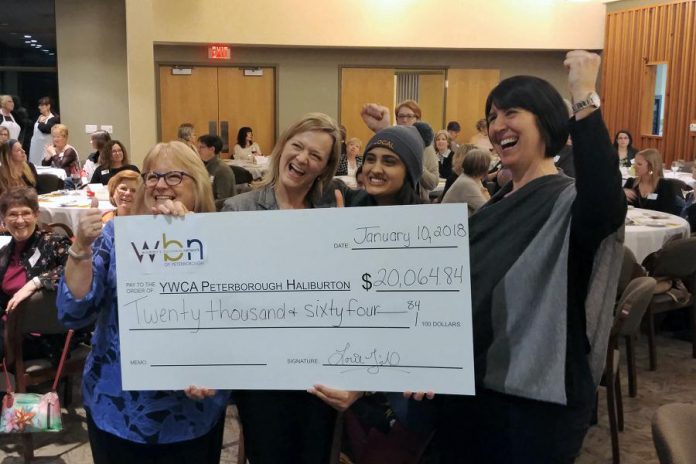 Anne Arnold and Corinna Campbell of YWCA Peterborough Haliburton with Sana Virji and Lori McKee of the Women's Business Network of Peterborough celebrating the donation of $20,064.84 to support the YWCA Crossroads Shelter. The funds were raised at WBN's annual fundraising gala in December. (Photo: Paula Kehoe / WBN)