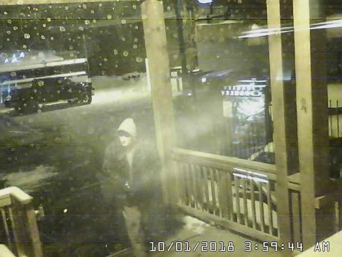 One of the three men who broke into the rear entrance of Wild Rock in downtown Peterborough before stealing Canada Goose parkas. (Photo: Wild Rock / Facebook)