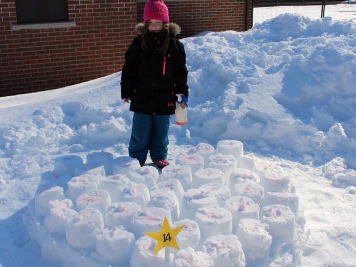 At last year's FrostFest, Myah Heacock won in the Kids Under 10 category for her "Marshmallow Heart" snow sculpture. (Photo courtesy of Impact 32)