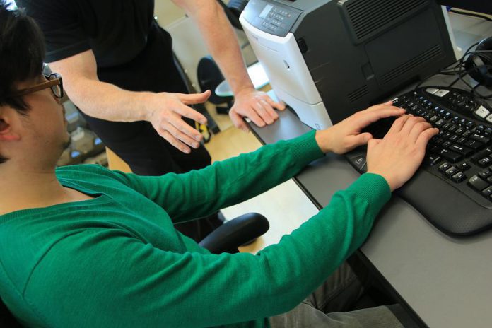 Adaptive Health Care Solutions' kinesiologist works in the areas of occupational rehabilitation, health coaching, functional capacity assessment, post-offer assessment, physical demands analysis, cognitive demands analysis, and disability management. Assessments are offered both in the clinic and in workplaces, including ergonomics assessments as pictured here.  (Photo: Adaptive Health Care Solutions)