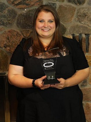 Erin McLean of McLean Berry Farm with her 2017 Young Professional Award from the Kawartha Chamber of Commerce & Tourism.