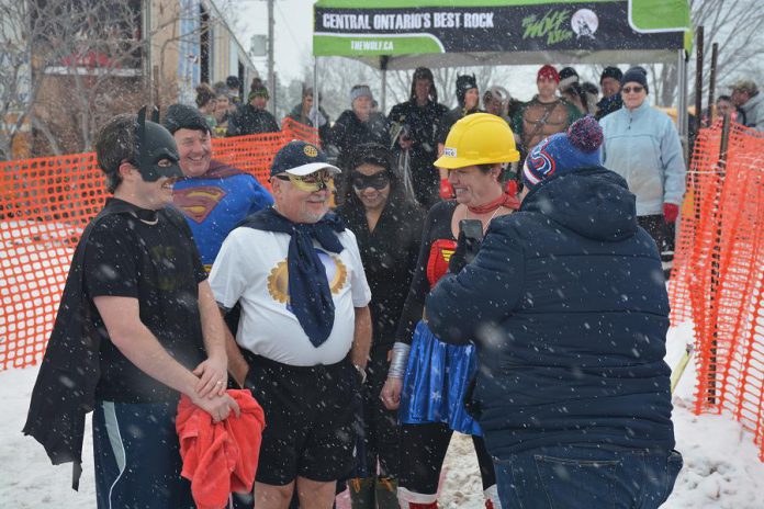 "Batman" (Trevor Copeland, President of BEL Rotary), "Superman" (Rick Storey, Assistant Governor of Peterborough Rotary Club), "Rotary Man" (Len Lifchus, President of the Rotary Club of Peterborough Kawartha), and "Wonderwoman" (Andi van Koeverden, President of the Rotary Club of Peterborough) at the 38th annual BEL Rotary Polar Plunge on February 4, 2018. This year's event raised more than $20,000 for local charities and organizations.   (Photo: Lynne Chant / Rotary Club of Peterborough Kawartha)