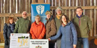 Property owner Mieke Schipper (third from left) has donated a conservation easement agreement to the Kawartha Land Trust (KLT) to protect the family's 100-acre Pigeon Lake property, home of the Gamiing Nature Centre, in perpetuity. Also pictured (left to right): Eva Kennedy, KLT Board of Directors; Ian Attridge, KLT Volunteer; Amy Elliott, Gamiing Nature Centre Board of Directors; Thom Unrau, KLT Land Stewardship Coordinator; Tara King, KLT Development Coordinator; and Mike Hendren, KLT Executive Director. (Photo courtesy of Kawartha Land Trust)