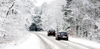 Two cars on a snow-covered road
