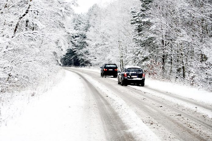 Two cars on a snow-covered road