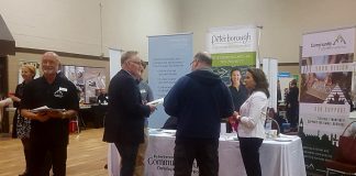 At a recent job fair for GE employees, Joe Rees and Rhonda Keenan of Peterborough & The Kawarthas Economic Development discuss options with attendees. Of the 200 attendees at the job fair, more than 70 signed up for futher information on business development. On March 7, 2018, Community Futures Peterborough, Peterborough & The Kawarthas Economic Development, and Fleming College will be providing GE employees with information on training, business development, and business financing opportunities. (Photo: Community Futures Peterborough)