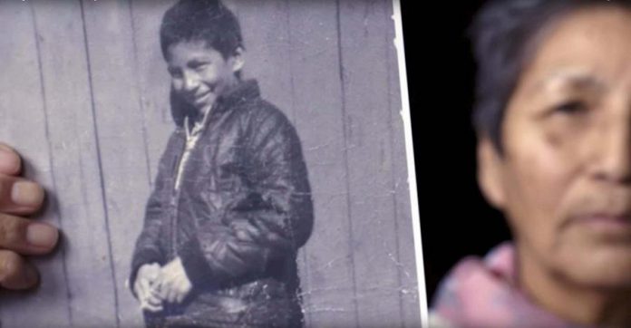 Pearl Achneepineskum holds a photo of her brother Chanie Wenjack in this screenshot from a Heritage Minute released in 2017 by Historica Canada.