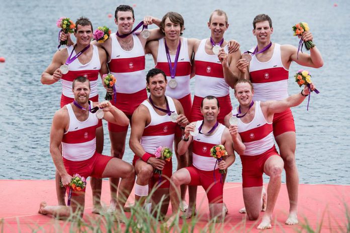 Jeremiah Brown (right) and other members of Team Canada's men's eights rowing team with their silver medals following the 2012 Summer Olympics in London. (Photo: Team Canada / Canadian Olympic Committee)