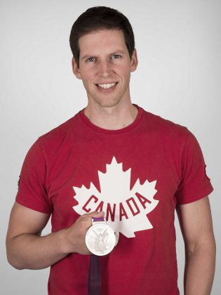 Jeremiah Brown with his Olympic silver medal. You can meet Brown and try on his silver medal at the Peterborough launch of his new book "The 4 Year Olympian" on March 31st at Chapter's  Brown will be donating a portion of proceeds of book sales at theat event to the Peterborough Rowing Club. (Photo courtesy of Jeremiah Brown)