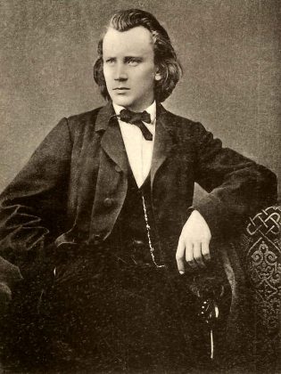 A portrait of German composer Johannes Brahms in 1865, the year he began work on 'A German Requiem'. (Public domain)