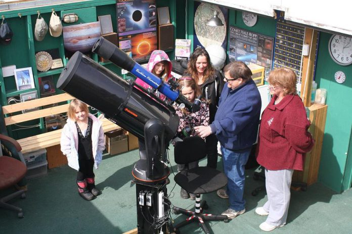 John Crossen explaining his telescope to a tour group at the Buckhorn Observatory, which he opened in 2002 and ran until 2014. John passed away at the age of 73 on March 22, 2018 after a long illness. (Photo: Crossen family)