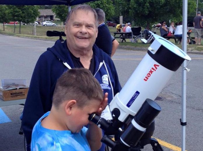 "I wish I'd started teaching basic astronomy ten years earlier. I never knew retirement could be so rewarding -- or so busy." - John Crossen, pictured here during Astronomy Day in Peterborough.  (Photo: Crossen family)