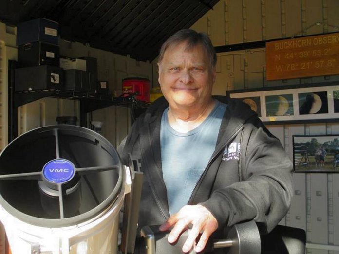 Astronomer John Crossen with his telescope in the original Buckhorn Observatory building, which he built shortly after he and his wife Deb Crossen moved from Toronto to Buckhorn.  (Photo: Crossen family)