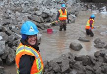 Otonabee Conservation staff and volunteers (Meredith Carter, Dave Wood, and Jasmine Gibson) capturing fish from the Millbrook Dam spillway pool for transfer into Baxter Creek. Almost 800 fish were captured and released, along with more than 200 crayfish and a few frogs. (Photo courtesy of Otonabee Conservation)