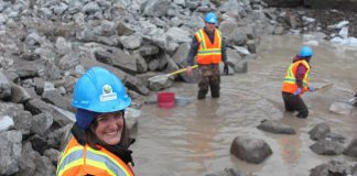 Otonabee Conservation staff and volunteers (Meredith Carter, Dave Wood, and Jasmine Gibson) capturing fish from the Millbrook Dam spillway pool for transfer into Baxter Creek. Almost 800 fish were captured and released, along with more than 200 crayfish and a few frogs. (Photo courtesy of Otonabee Conservation)