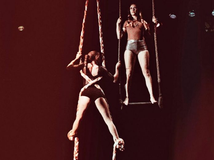 Opal (Jen) Elchuk and Kayla Stanistreet in "Captive:ated", one of 13 new works being presented by Public Energy at Emergency #22 from March 22 to 24, 2018. A twist on the Grimms Brothers' Rapunzel tales, "Captive:ated" is a work of circus theatre employing trapeze and braided silks and will be performed at Market Hall Performing Arts Centre on March 22 and 23. (Photo: Erin Hanes Photography)