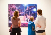 Visitors to the Art Gallery of Peterborough looking at a painting by Keita Morimoto at the opening of the 'These things I Have Seen' exhibition, one of three exhibits on now at the gallery until June 24th. (Photo: Karol Orzechowski / Decipher Images)
