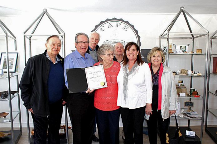 Peterborough MPP Jeff Leal (second from left) was on hand to congratulate Kelli Coon (second from right) at the grand opening of her new venture Lock Stop Café in Buckhorn on April 21, 2018. (Photo: Lock Stop Café / Facebook)